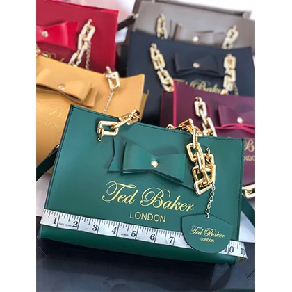 High quality TED baker crossbody bag heavy double sided chain handle and brand tag for only price in Pakistan
