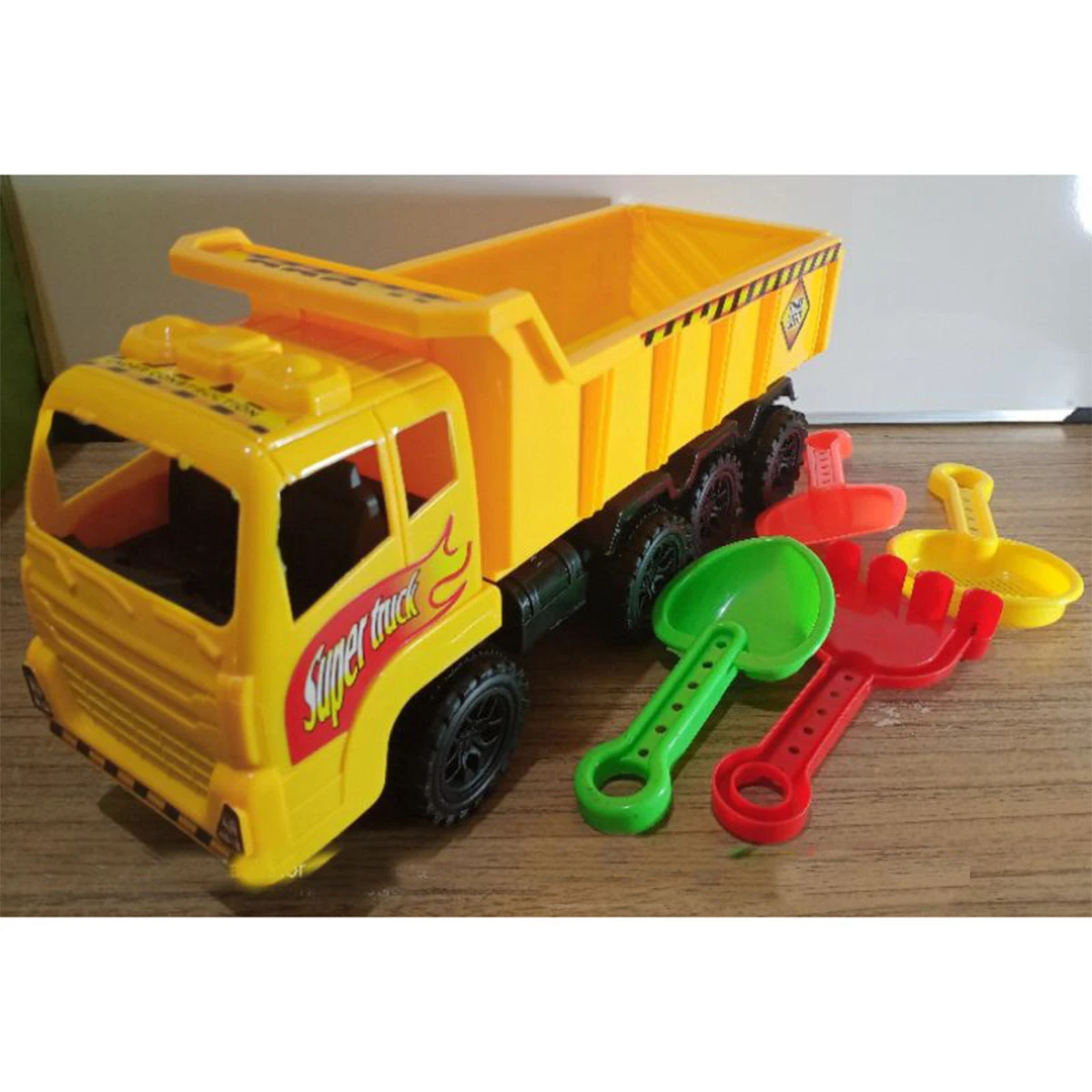 Toys Kids’ Yellow Friction Dump Truck, Tilting Dump Bed, Knobby Wheels, and quality Axles Fit for Indoors and Outdoors, Haul Sand, Dirt, or Toys, for Ages 2+ price in Pakistan