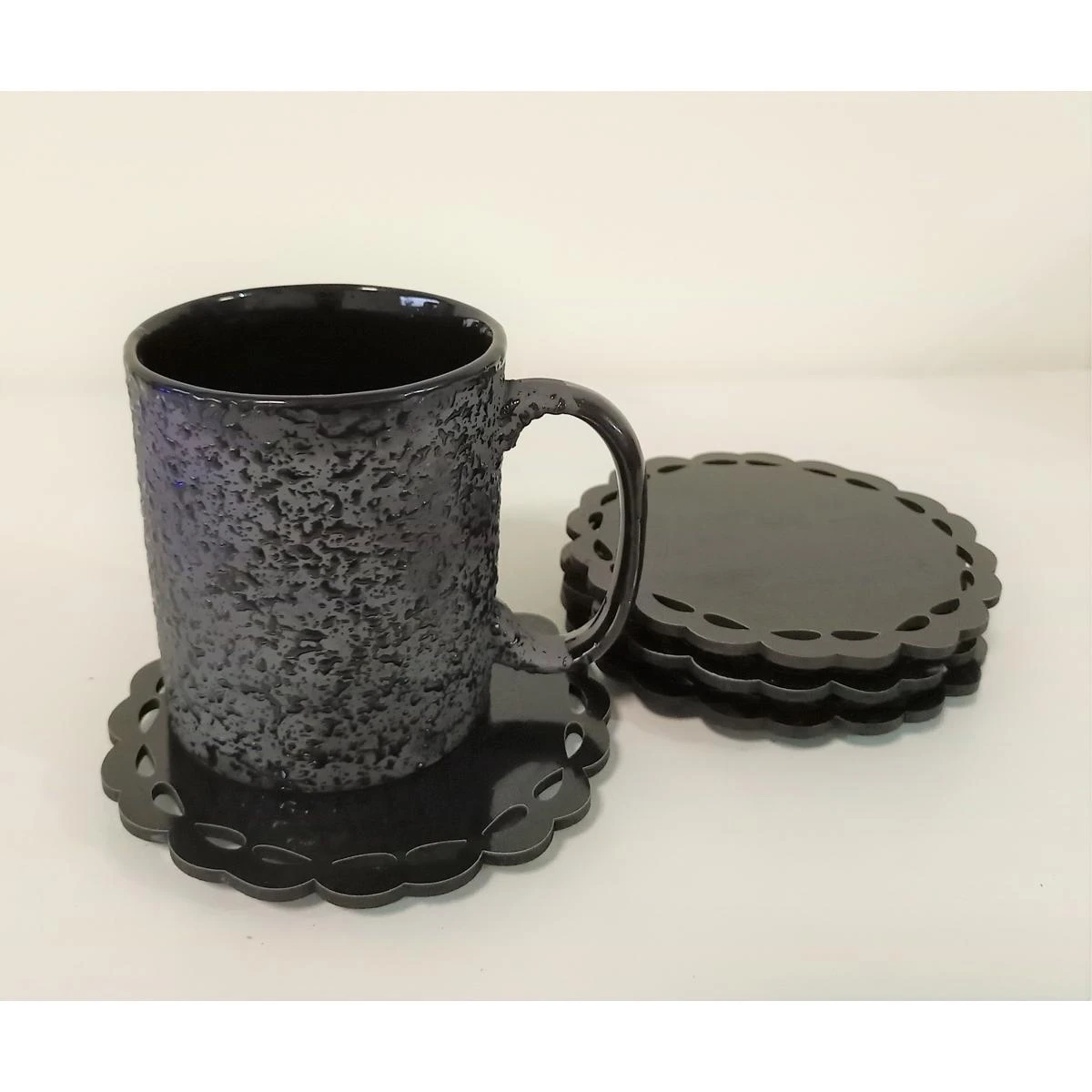 Six Piece Coasters, Black Color, Circular Shape with Curvy edges (No Stand) price in Pakistan