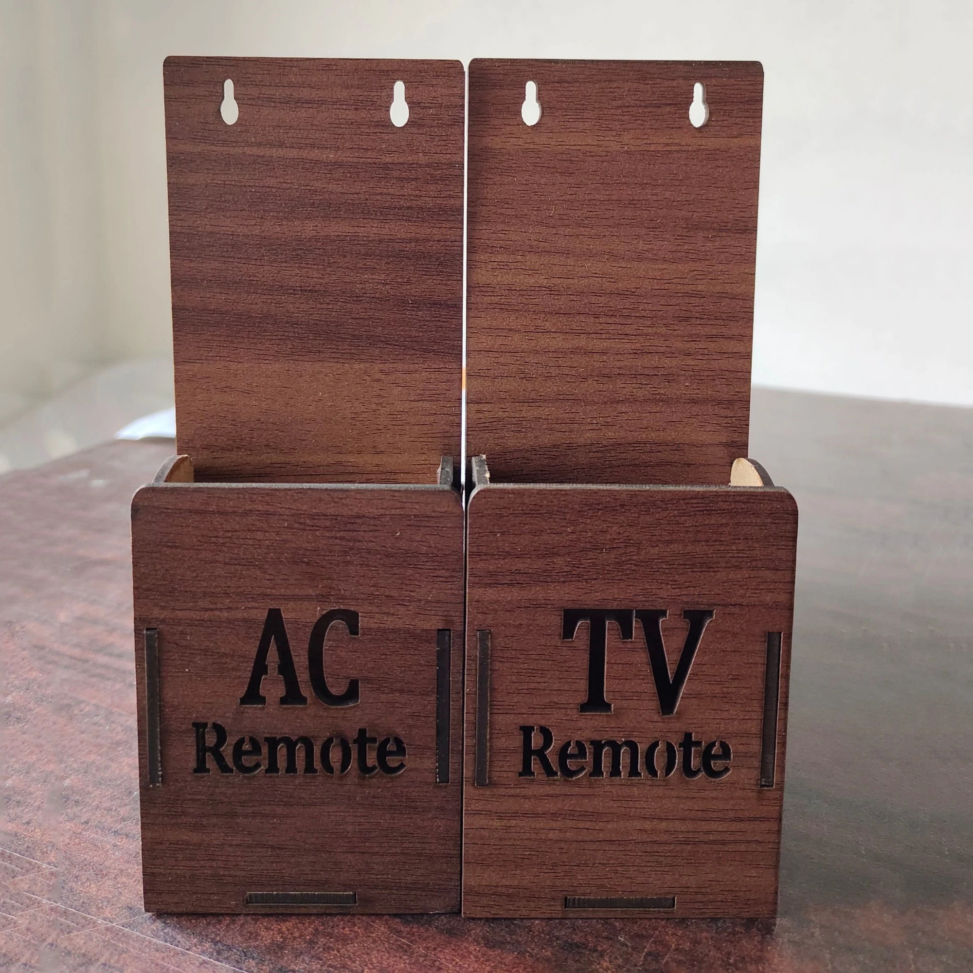 Pack of 2 Universal TV AC Remote Holder Wall Mounted Wooden Stand price in Pakistan
