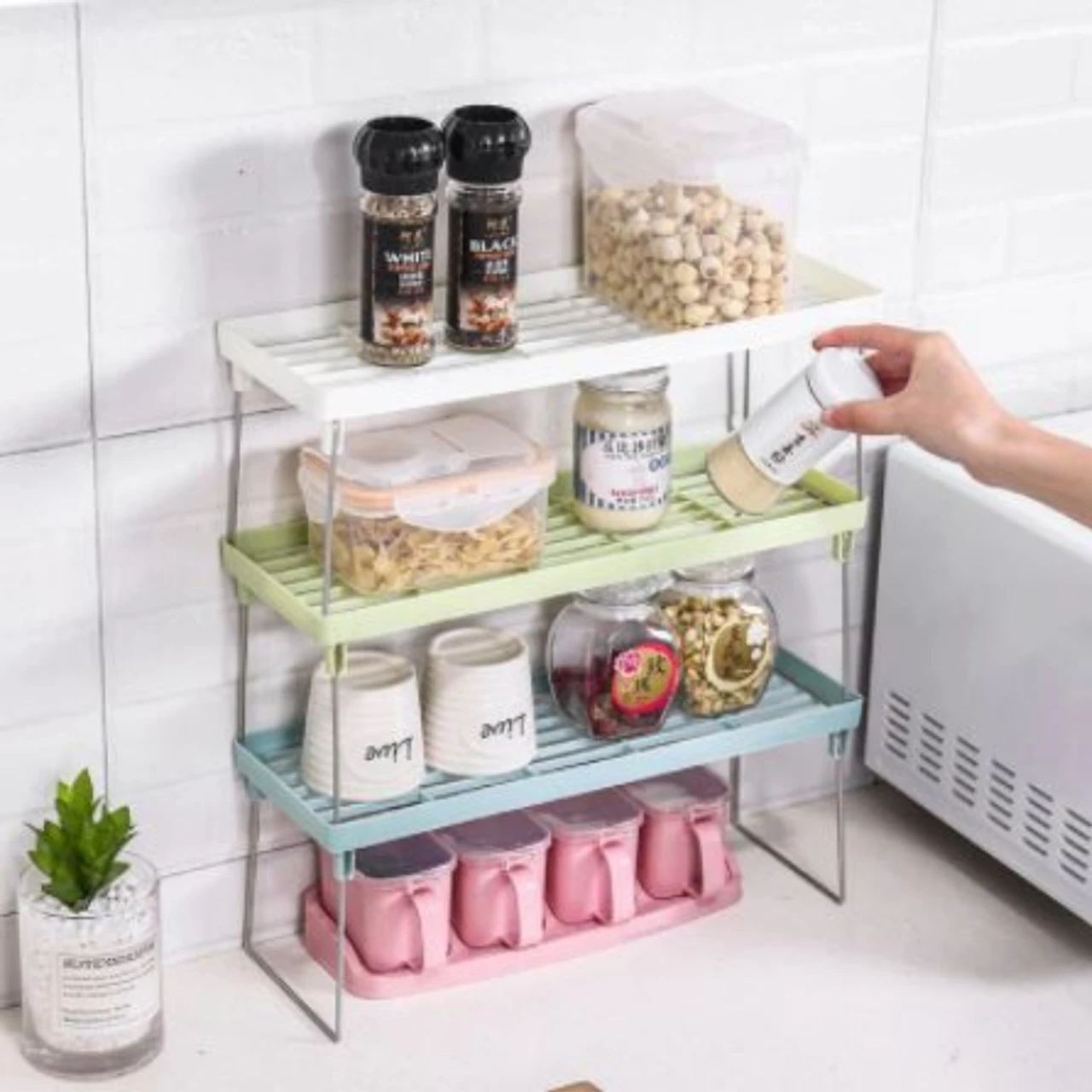 1 piece Stack up shelf space saver plastic racks Folding Kitchen cupboard Organizer Cabinet price in Pakistan